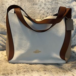 Cream, Tan and Brown Coach Tote Bag Center zip compartment
Snap closure